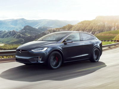 Tesla Model X with falcon-wing doors open