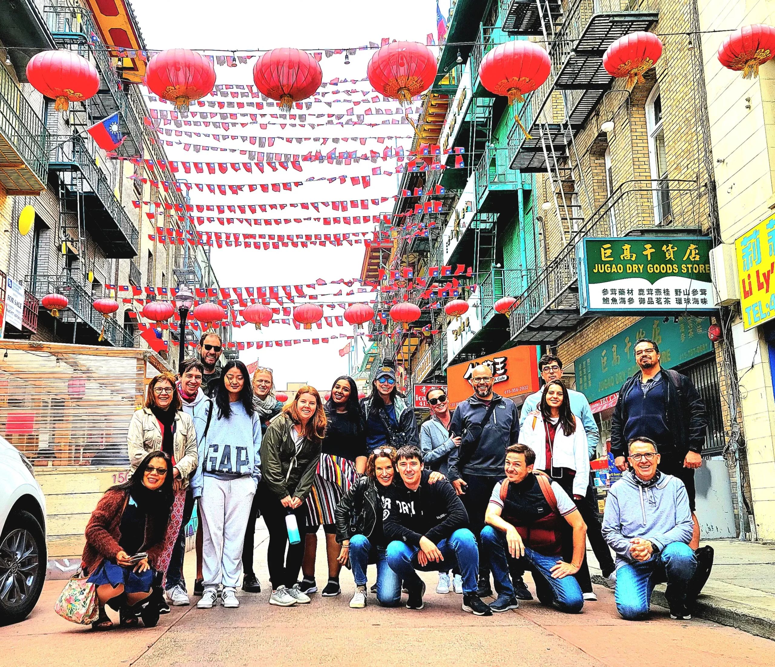 Walking tour group exploring Portsmouth Square with a guide, showcasing the interactive experience