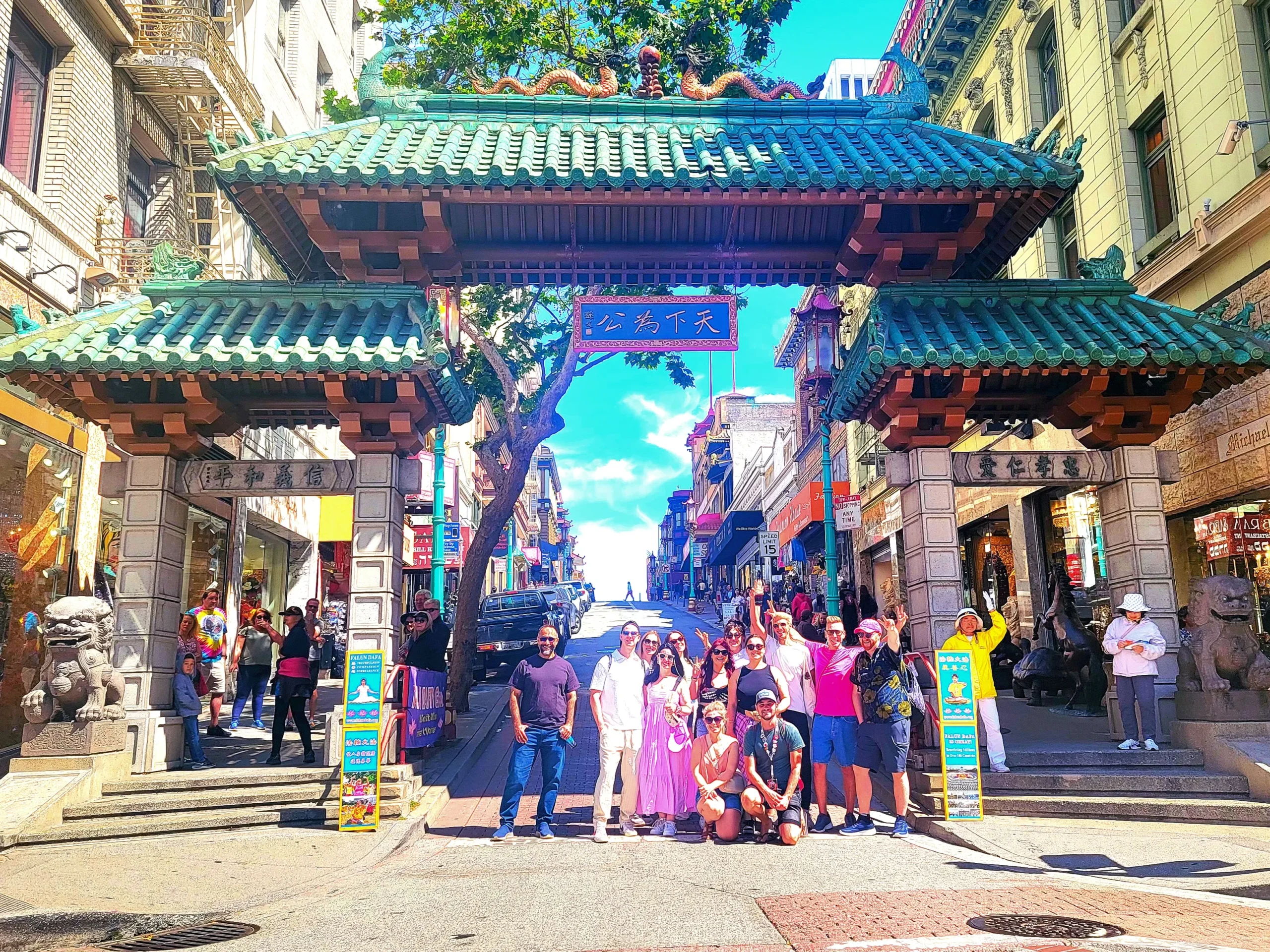 Historical significance of Portsmouth Square with the American flag monument and Chinatown elements