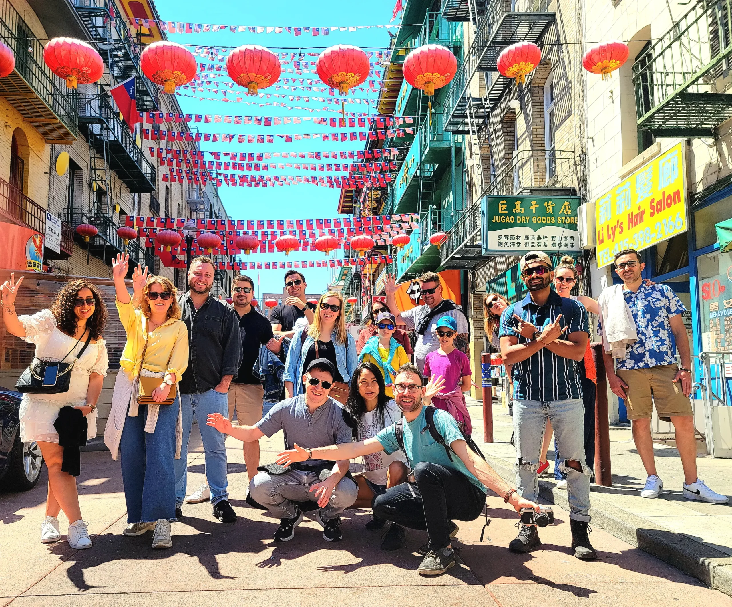 Tourists on a Free SF Tour walking tour at Waverly Place, experiencing the vibrant culture of Chinatown